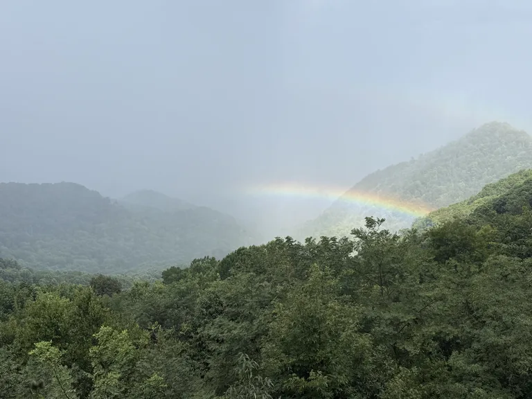 A rainbow over a green mountain valley in Western North Carolina